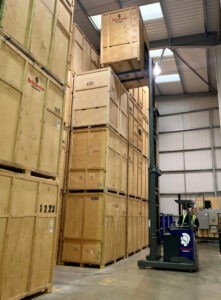 forklift in action in storage warehouse